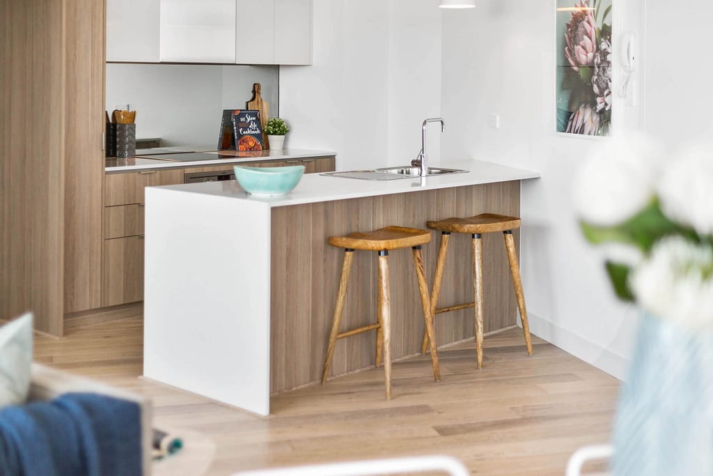 Image of timber and marble kitchen island